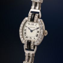 A FINE & RARE LADY'S PLATINUM, 18K SOLID GOLD, DIAMOND, ONYX & BLACK ENAMEL CARTIER COCKTAIL WATCH