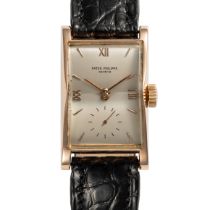A FINE GENTLEMAN'S SIZE 18K SOLID ROSE GOLD PATEK PHILIPPE RECTANGULAR WRIST WATCH DATED 1953,