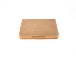 A 9ct gold rectangular box, circa 1947, within engine-turned decoration, internal inscription: