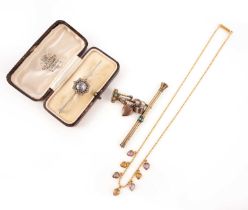 A collection of jewellery, comprising: a pale violet sapphire and diamond bar brooch within star