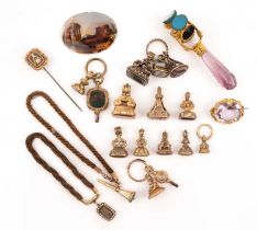 A collection of fob seals and jewellery, comprising: individual gem-set fob seals mounted in gold or
