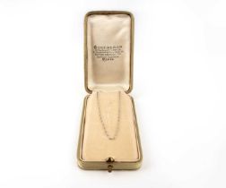 A fine link platinum necklace, with a Boucheron pendant box and with a letter dated Dec. 30 '32,