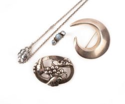 Georg Jensen, four items of silver jewellery, including a silver foliate brooch, signed and numbered