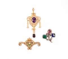 Two antique brooches and a pendant, comprising: an Edwardian amethyst and seed pearl pendant, in