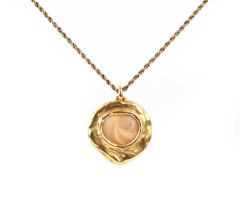 Elizabeth Gage, an 18ct gold and shell pendant, circa 1970, the shell set in a wide textured gold