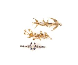 Three antique brooches, comprising an Edwardian seed pearl-set gold swallow brooch, length 5cm, an