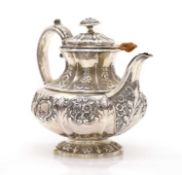 A George III silver teapot,