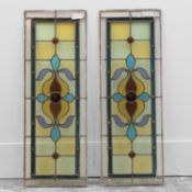 A pair of Art Nouveau stained glass window door panels