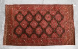 A pair of Bokhara red ground rugs,