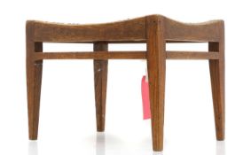 An Arthur Simpson Arts and Crafts oak stool,