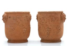 A pair of Davenport terracotta wine coolers,