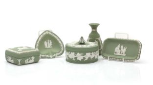 A large collection of Wedgwood green jasperware,