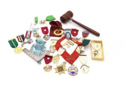 A large collection of metal and silver gilt Masonic medals and collar jewels,