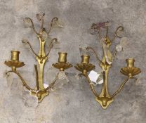 A pair of brass two-light wall sconces,
