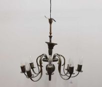 A wrought-iron Dutch-style chandelier,