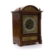 A German walnut-cased 'Ting Tang' mantel clock,