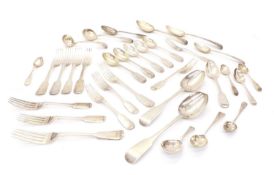 A collection of matching silver fiddle pattern cutlery,