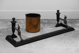 A Victorian iron and brass fender,