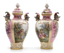 A pair of Dresden mask vases and covers,