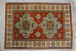 A Kazak wool rug,