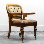 A Victorian mahogany leather upholstered library chair,