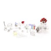 A collection of Swarovski crystal flowers,
