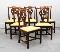 A set of six George III mahogany dining chairs,