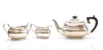A three-piece silver tea service,