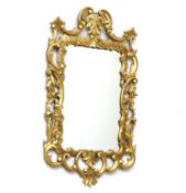 A George III style giltwood wall mirror,