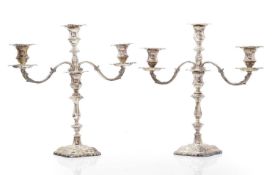 A matched pair of silver candlabra,