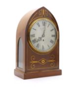 An Edwardian mahogany and inlaid mantel clock,