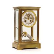 A brass mantel clock,