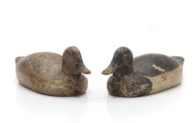 Two carved and painted decoy ducks,
