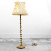 A gilt-metal standard lamp,