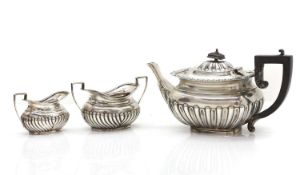 A three part silver tea service,