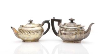 Two silver teapots,
