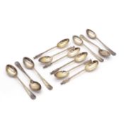 Two cased sets of six silver coffee spoons,