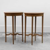 A pair of Edwardian mahogany lamp tables,