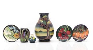 A collection of Moorcroft pottery,