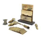 Four Victorian brass paperclips,