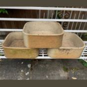 A group of three fireclay planters,