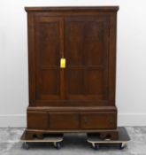A George III oak cupboard,