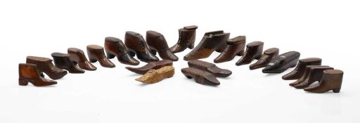 A group of treen shoes snuff boxes,