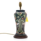 A Moorcroft 'Holly Hatch' pattern pottery table lamp,