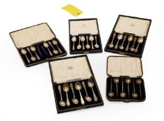A collection of case silver teaspoons,
