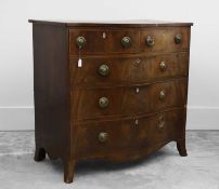 A George III mahogany inlaid serpentine chest of drawers,