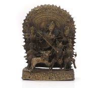 An Indian brass group of the Goddess Durga,