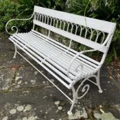 A cast-iron and painted wooden bench,