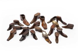 A group of treen shoes snuff boxes,