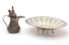 A silver repoussé dish,